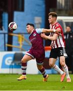 28 May 2021; Chris Lyons of Drogheda United in action against Cameron McJannet of Derry City during the SSE Airtricity League Premier Division match between Drogheda United and Derry City at Head in the Game Park in Drogheda, Louth. Photo by Eóin Noonan/Sportsfile