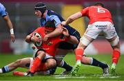 28 May 2021; CJ Stander of Munster is tackled by Olly Robinson of Cardiff Blues during the Guinness PRO14 Rainbow Cup match between Munster and Cardiff Blues at Thomond Park in Limerick. Photo by Piaras Ó Mídheach/Sportsfile