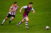 28 May 2021; Ronan Murray of Drogheda United in action against Joe Thomson of Derry City during the SSE Airtricity League Premier Division match between Drogheda United and Derry City at Head in the Game Park in Drogheda, Louth. Photo by Eóin Noonan/Sportsfile