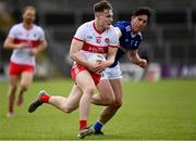 29 May 2021; Ethan Doherty of Derry in action against Killian Brady of Cavan during the Allianz Football League Division 3 North Round 3 match between Cavan and Derry at Kingspan Breffni in Cavan. Photo by Harry Murphy/Sportsfile