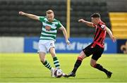 29 May 2021; Sean Hoare of Shamrock Rovers in action against Aaron Robinson of Longford Town during the SSE Airtricity League Premier Division match between Longford Town and Shamrock Rovers at Bishopsgate in Longford. Photo by Seb Daly/Sportsfile