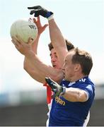 29 May 2021; Martin Reilly of Cavan in action against Padraig McGrogan of Derry during the Allianz Football League Division 3 North Round 3 match between Cavan and Derry at Kingspan Breffni in Cavan. Photo by Harry Murphy/Sportsfile
