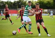 29 May 2021; Aaron Greene of Shamrock Rovers in action against Paddy Kirk, left, and Michael McDonnell of Longford Town during the SSE Airtricity League Premier Division match between Longford Town and Shamrock Rovers at Bishopsgate in Longford. Photo by Seb Daly/Sportsfile