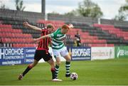 29 May 2021; Rory Gaffney of Shamrock Rovers in action against Aaron O'Driscoll of Longford Town during the SSE Airtricity League Premier Division match between Longford Town and Shamrock Rovers at Bishopsgate in Longford. Photo by Seb Daly/Sportsfile