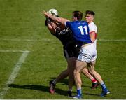 29 May 2021; Gearóid McKiernan of Cavan in action against Roan Lynch, left, and Conor Doherty of Derry during the Allianz Football League Division 3 North Round 3 match between Cavan and Derry at Kingspan Breffni in Cavan. Photo by Harry Murphy/Sportsfile