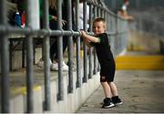 29 May 2021; Seanie Snow, age 3, son of Fermanagh goalkeeper Chris Snow plays in the stands during the Allianz Football League Division 3 North Round 3 match between Fermanagh and Longford at Brewster Park in Enniskillen, Fermanagh. Photo by David Fitzgerald/Sportsfile
