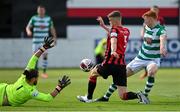 29 May 2021; Rory Gaffney of Shamrock Rovers has his shot blocked by golkeeper Lee Steacy, left, and Michael McDonnell of Longford Town during the SSE Airtricity League Premier Division match between Longford Town and Shamrock Rovers at Bishopsgate in Longford. Photo by Seb Daly/Sportsfile