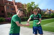 29 May 2021; Conor Noss, left, and Ryan Johansson apply sun cream before a Republic of Ireland U21 training session in Marbella, Spain. Photo by Stephen McCarthy/Sportsfile