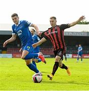 29 May 2021; Liam Burt of Bohemians in action against Josh Collins of Waterford during the SSE Airtricity League Premier Division match between Bohemians and Waterford at Dalymount Park in Dublin. Photo by Ramsey Cardy/Sportsfile