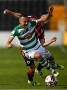 29 May 2021; Graham Burke of Shamrock Rovers is tackled by Karl Chambers of Longford Town during the SSE Airtricity League Premier Division match between Longford Town and Shamrock Rovers at Bishopsgate in Longford. Photo by Seb Daly/Sportsfile