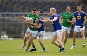 29 May 2021; Iain Corbett of Limerick in action against Mark Kenny and Seanie Furlong of Wicklow during the Allianz Football League Division 3 South Round 3 match between Wicklow and Limerick at County Grounds in Aughrim, Wicklow. Photo by Matt Browne/Sportsfile