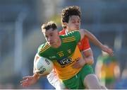 29 May 2021; Ciarán Thompson of Donegal is tackled by James Morgan of Armagh during the Allianz Football League Division 1 North Round 3 match between Armagh and Donegal at the Athletic Grounds in Armagh. Photo by Piaras Ó Mídheach/Sportsfile
