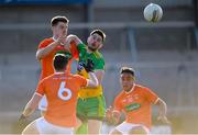 29 May 2021; Ryan McHugh of Donegal in action against Armagh players, from left, Niall Grimley, Aaron McKay and Jemar Hall during the Allianz Football League Division 1 North Round 3 match between Armagh and Donegal at the Athletic Grounds in Armagh. Photo by Piaras Ó Mídheach/Sportsfile