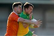 29 May 2021; Peadar Mogan of Donegal is tackled by Niall Grimley of Armagh during the Allianz Football League Division 1 North Round 3 match between Armagh and Donegal at the Athletic Grounds in Armagh. Photo by Piaras Ó Mídheach/Sportsfile