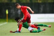 30 May 2021; Joshua Kayode of Republic of Ireland in action against Marco Burch of Switzerland during the U21 international friendly match between Switzerland and Republic of Ireland at Dama de Noche Football Centre in Marbella, Spain. Photo by Stephen McCarthy/Sportsfile