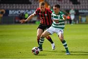 29 May 2021; Dean Williams of Shamrock Rovers in action against Michael McDonnell of Longford Town during the SSE Airtricity League Premier Division match between Longford Town and Shamrock Rovers at Bishopsgate in Longford. Photo by Seb Daly/Sportsfile
