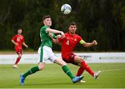 30 May 2021; Conor Grant of Republic of Ireland in action against Leonidas Stergiou of Switzerland during the U21 international friendly match between Switzerland and Republic of Ireland at Dama de Noche Football Centre in Marbella, Spain. Photo by Stephen McCarthy/Sportsfile