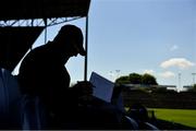 30 May 2021; Stadium announcer John Hopkins finalises his notes before the Allianz Football League Division 2 North Round 3 match between Mayo and Meath at Elverys MacHale Park in Castlebar, Mayo. Photo by Sam Barnes/Sportsfile