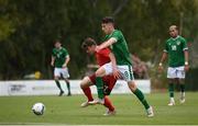 30 May 2021; Tim Staubli of Switzerland and Conor Noss of Republic of Ireland during the U21 international friendly match between Switzerland and Republic of Ireland at Dama de Noche Football Centre in Marbella, Spain. Photo by Stephen McCarthy/Sportsfile