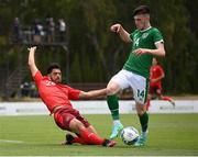 30 May 2021; Nicholas Vouilloz of Switzerland and Alex Gilbert of Republic of Ireland during the U21 international friendly match between Switzerland and Republic of Ireland at Dama de Noche Football Centre in Marbella, Spain. Photo by Stephen McCarthy/Sportsfile