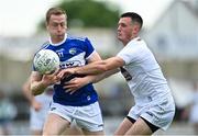 30 May 2021; Paul Kingston of Laois is tackled by Eoin Doyle of Kildare during the Allianz Football League Division 2 South Round 3 match between Laois and Kildare at MW Hire O'Moore Park in Portlaoise, Laois. Photo by Piaras Ó Mídheach/Sportsfile