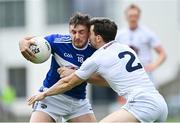 30 May 2021; Gary Walsh of Laois is tackled by Mark Dempsey of Kildare during the Allianz Football League Division 2 South Round 3 match between Laois and Kildare at MW Hire O'Moore Park in Portlaoise, Laois. Photo by Piaras Ó Mídheach/Sportsfile