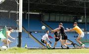 30 May 2021; James Carr of Mayo shoots to score his side's second goal, despite the efforts of Meath players Seamus Lavin left, and Cathal Hickey, right, during the Allianz Football League Division 2 North Round 3 match between Mayo and Meath at Elverys MacHale Park in Castlebar, Mayo. Photo by Sam Barnes/Sportsfile