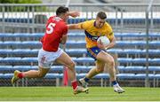 30 May 2021; Eoin Cleary of Clare in action against Tadhg Corkery of Cork during the Allianz Football League Division 2 South Round 3 match between Clare and Cork at Cusack Park in Ennis, Clare. Photo by Harry Murphy/Sportsfile