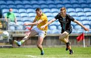 30 May 2021; Bryan Menton of Meath shoots to score his side's second goal despite the efforts of Jack Carney of Mayo during the Allianz Football League Division 2 North Round 3 match between Mayo and Meath at Elverys MacHale Park in Castlebar, Mayo. Photo by Sam Barnes/Sportsfile