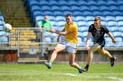 30 May 2021; Bryan Menton of Meath shoots to score his side's second goal despite the efforts of Jack Carney of Mayo during the Allianz Football League Division 2 North Round 3 match between Mayo and Meath at Elverys MacHale Park in Castlebar, Mayo. Photo by Sam Barnes/Sportsfile