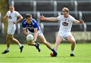 30 May 2021; John O'Loughlin of Laois in action against Luke Flynn of Kildare during the Allianz Football League Division 2 South Round 3 match between Laois and Kildare at MW Hire O'Moore Park in Portlaoise, Laois. Photo by Piaras Ó Mídheach/Sportsfile