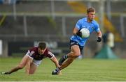 30 May 2021; Jonny Cooper of Dublin evades the tackle by Shane Walsh of Galway during the Allianz Football League Division 1 South Round 3 match between Galway and Dublin at St Jarlath's Park in Tuam, Galway. Photo by Ramsey Cardy/Sportsfile