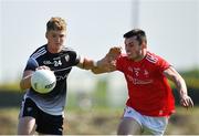 30 May 2021; Red Óg Murphy of Sligo in action against Dan Corcoran of Louth during the Allianz Football League Division 4 North Round 3 match between Louth and Sligo at Geraldines Club in Haggardstown, Louth. Photo by Seb Daly/Sportsfile