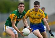 30 May 2021; Paudie Clifford of Kerry in action against Conor Daly of Roscommon during the Allianz Football League Division 1 South Round 3 match between Roscommon and Kerry at Dr Hyde Park in Roscommon. Photo by Brendan Moran/Sportsfile