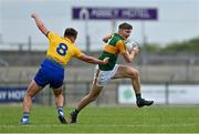 30 May 2021; Diarmuid O'Connor of Kerry is tackled by Enda Smith of Roscommon during the Allianz Football League Division 1 South Round 3 match between Roscommon and Kerry at Dr Hyde Park in Roscommon. Photo by Brendan Moran/Sportsfile
