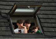30 May 2021; Supporters watch on from a nearby house during the Allianz Football League Division 1 South Round 3 match between Galway and Dublin at St Jarlath's Park in Tuam, Galway. Photo by Ramsey Cardy/Sportsfile