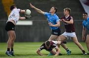 30 May 2021; Con O'Callaghan of Dublin blocks a clearance by Galway goalkeeper Bernard Power on his way to scoring his side's first goal during the Allianz Football League Division 1 South Round 3 match between Galway and Dublin at St Jarlath's Park in Tuam, Galway. Photo by Ramsey Cardy/Sportsfile