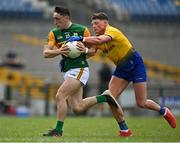 30 May 2021; Paudie Clifford of Kerry is tackled by Conor Cox of Roscommon during the Allianz Football League Division 1 South Round 3 match between Roscommon and Kerry at Dr Hyde Park in Roscommon. Photo by Brendan Moran/Sportsfile