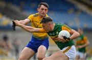 30 May 2021; David Clifford of Kerry is tackled by Brian Stack of Roscommon during the Allianz Football League Division 1 South Round 3 match between Roscommon and Kerry at Dr Hyde Park in Roscommon. Photo by Brendan Moran/Sportsfile