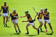 30 May 2021; Alan Murphy of Kilkenny in action against Liam Ryan, left, and Glen Malone of Wexford during the Allianz Hurling League Division 1 Group B Round 3 match between Kilkenny and Wexford at UPMC Nowlan Park in Kilkenny. Photo by Ray McManus/Sportsfile