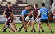 30 May 2021; Seán MacMahon of Dublin gets away a pass under pressure from Dylan McHugh of Galway during the Allianz Football League Division 1 South Round 3 match between Galway and Dublin at St Jarlath's Park in Tuam, Galway. Photo by Ramsey Cardy/Sportsfile