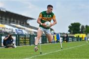 30 May 2021; Paul Geaney of Kerry jumps over a sideline flag to keep the ball in play during the Allianz Football League Division 1 South Round 3 match between Roscommon and Kerry at Dr Hyde Park in Roscommon. Photo by Brendan Moran/Sportsfile