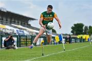 30 May 2021; Paul Geaney of Kerry jumps over a sideline flag to keep the ball in play during the Allianz Football League Division 1 South Round 3 match between Roscommon and Kerry at Dr Hyde Park in Roscommon. Photo by Brendan Moran/Sportsfile