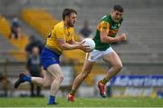 30 May 2021; Conor Devaney of Roscommon in action against Joe O'Connor of Kerry during the Allianz Football League Division 1 South Round 3 match between Roscommon and Kerry at Dr Hyde Park in Roscommon. Photo by Brendan Moran/Sportsfile