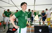 30 May 2021; Louie Watson of Republic of Ireland pulls on his jersey before the U21 international friendly match between Switzerland and Republic of Ireland at Dama de Noche Football Centre in Marbella, Spain. Photo by Stephen McCarthy/Sportsfile