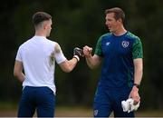 30 May 2021; Republic of Ireland goalkeeping coach Rene Gilmartin with goalkeeper Brian Maher before the U21 international friendly match between Switzerland and Republic of Ireland at Dama de Noche Football Centre in Marbella, Spain. Photo by Stephen McCarthy/Sportsfile