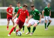 30 May 2021; Tim Staubli of Switzerland in action against Will Ferry of Republic of Ireland during the U21 international friendly match between Switzerland and Republic of Ireland at Dama de Noche Football Centre in Marbella, Spain. Photo by Stephen McCarthy/Sportsfile