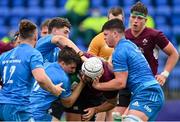 28 May 2021; Ben Carson of Ireland U20 is tackled by Tim Corkery, left, and Aaron Coleman of Leinster A during the match between Ireland U20 and Leinster A at Energia Park in Dublin. Photo by Ramsey Cardy/Sportsfile