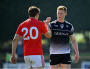 30 May 2021; Peter Laffey of Sligo and Eoghan Duffy of Louth following their Allianz Football League Division 4 North Round 3 match at Geraldines Club in Haggardstown, Louth. Photo by Seb Daly/Sportsfile
