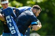 31 May 2021; Cian Healy is tackled by Scott Penny during Leinster Rugby squad training at UCD in Dublin. Photo by Ramsey Cardy/Sportsfile